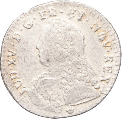 une pièce d'argent portant l'image d'un homme