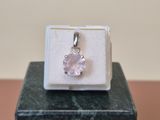 sterling silver and amethorate pendant on a marble block