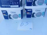 two boxes of duluxs sitting on top of a white table