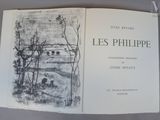un livre dans lequel figure le dessin d'un paysage