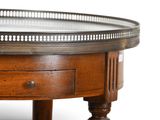 a wooden table with a glass top on a white background
