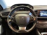 the interior of a car with a steering wheel, dashboard, and touch screen