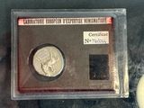 a picture of a silver coin in a plastic case