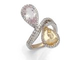 une bague en or jaune et en or blanc sertie de deux diamants taille poire
