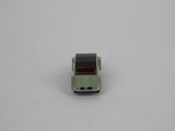 a small toy car that is sitting on a table