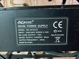a close up of a black power supply on a table