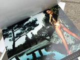 a magazine with a picture of a woman in a bathing suit