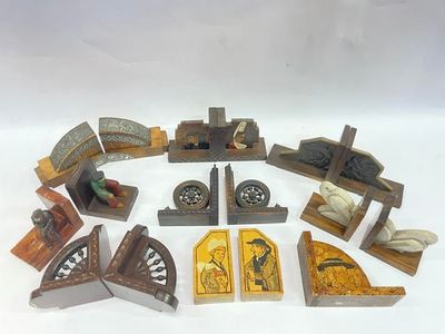 a lot of small wooden toys that are on a table