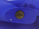 a close up of a blue vase with a number on it