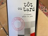 a bottle of wine that is sitting on a table