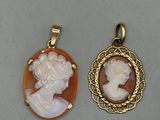 two cameo cameos of a woman and a man in profile