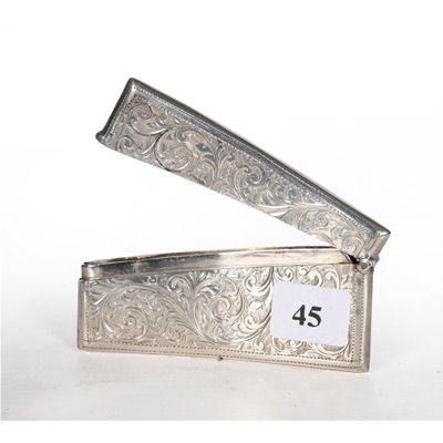 a silver money clip that has a number on it