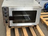an image of a toaster oven sitting on a pallet