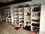 a room with a lot of bottles and bottles on the shelves
