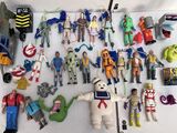 a lot of action figures that are on the table