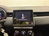 the dashboard of a car with a digital display in the center