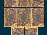 six square coasters with a swirl design on them on a blue background