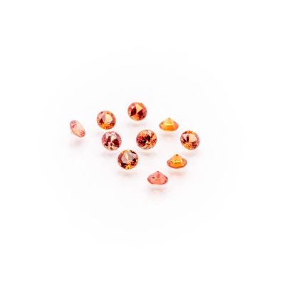 a group of orange sapphires on a white background