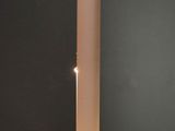 a lamp that is on a table in a room