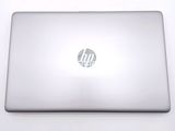 a white laptop with a hp logo on the screen