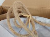 a box with a rope tied to it and a box with a bag in it