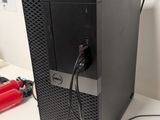 a desktop computer sitting on a desk next to a mouse