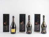 three bottles of champagne and three boxes of chocolate