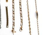 a lot of chains that are hanging on the wall