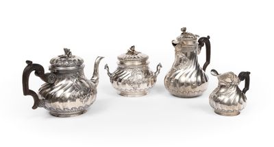 un ensemble composé de quatre théières en argent et d'une cafetière