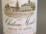 a bottle of wine that is sitting on a table