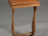 an image of a small wooden table with a drawer
