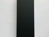 an image of a close up of a black speaker on a table