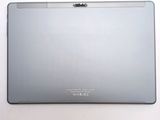 the back of a silver laptop computer sitting on top of a white surface