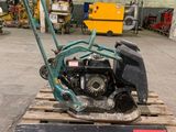 a small machine that is sitting on top of a pallet