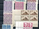 several different types of stamps are on a black surface