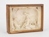 une image représentant une sculpture d'un homme et d'une femme, dans un cadre en bois