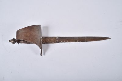 a small knife that is laying on a white surface