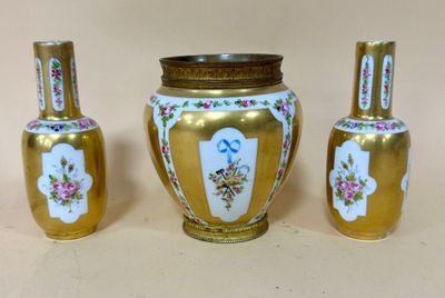 three vases that are sitting next to each other on a table