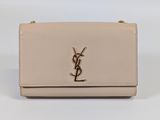 saint laurent mono monogram clutch bag in beige