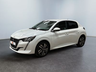 the white car is parked in a room with a gray floor