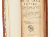 an open book with a picture of a globe on it