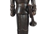 statue d'un casse-noisette tenant un tambour et une trompette
