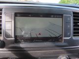a picture of a car with a gps device in the dash