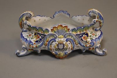 a decorative bowl that is sitting on a table