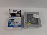 two boxes of philips products sitting on a table