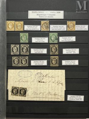 a picture of a collection of stamps on display in a glass case