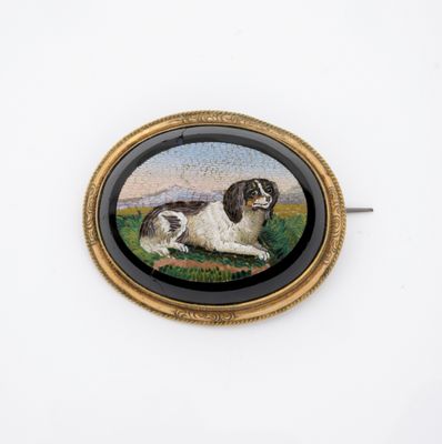 une image représentant un tableau où l'on voit un chien couché dans un champ