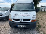 a white van that is parked next to a white van