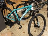two bikes that are sitting on the floor in a store