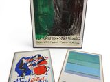 three framed art pieces of various colors and designs